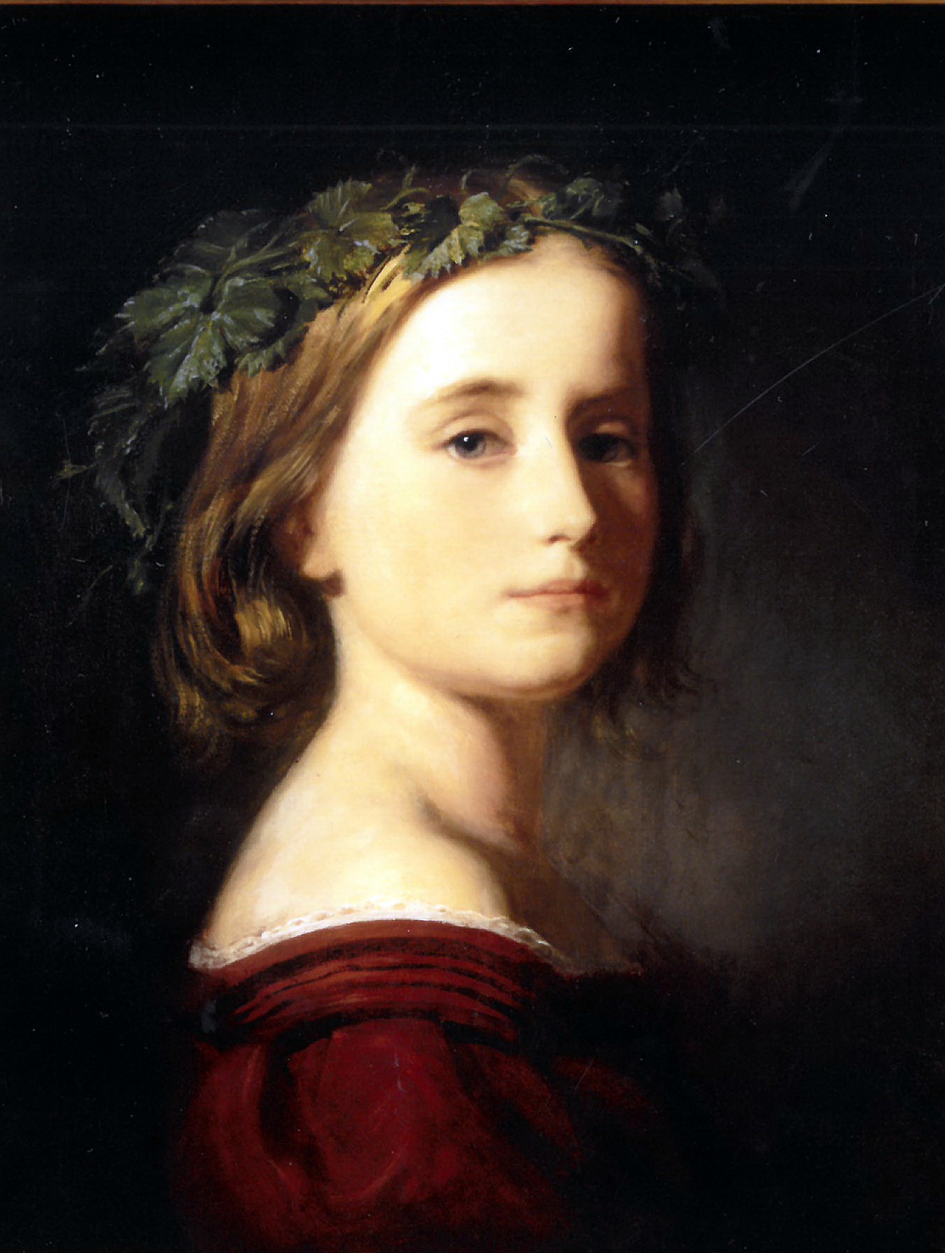 Mädchen mit Weinlaub im Haar
