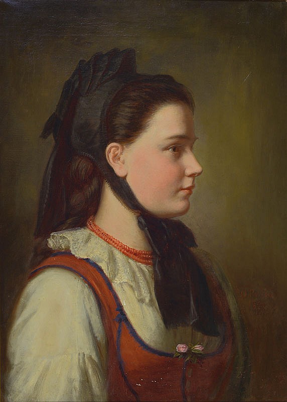 Portrait einer jungen Frau in Tracht